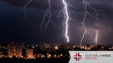 Lightning strikes over a city